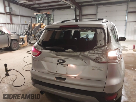 2013 Ford Escape Titanium z VIN 1FMCU0J94DUA93128, wystawiony jako IAAI lot #41612072 z przebiegiem 174 274 mil mil oraz . Historia ofert i sprzedaży dostępna na DreamBid. Obrazek 6.