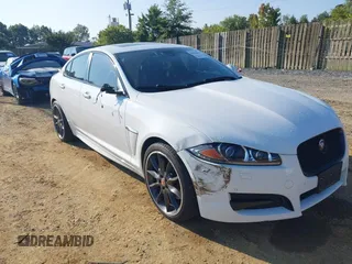 2015 Jaguar XF V6 Portfolio with VIN SAJWJ0FF4F8U72149, listed as a IAAI auction lot 40386903 with 49,055 mi miles. Bid and sale history available at carsss.com. Image 1.