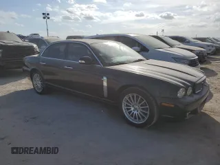 2008 Jaguar XJ with VIN SAJWA71B18SH25255, listed as a Copart auction lot 74781714 with 31,233 mi miles and Salvage Title. Bid and sale history available at carsss.com. Image 4.