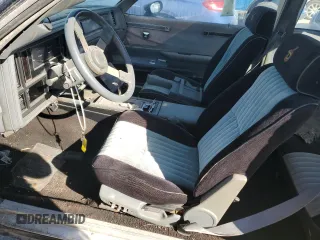 1986 Buick Regal with VIN 1G4GK4774GP228180, listed as a Copart auction lot 76890864 with Not Provided miles and Salvage Title. Bid and sale history available at DreamBid. Image 7.