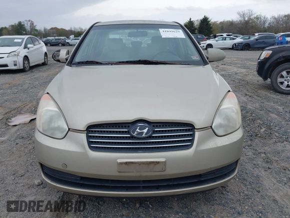 2006 Hyundai Accent GLS z VIN KMHCN46C66U058232, wystawiony jako IAAI lot #41899629 z przebiegiem 182 669 mil mil oraz . Historia ofert i sprzedaży dostępna na DreamBid. Obrazek 12.