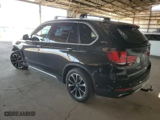 2018 BMW X5 xDrive40e iPerformance with VIN 5UXKT0C53J0W02429, listed as a Copart auction lot 51874485 with 57,480 mi miles and Salvage Title. Bid and sale history available at carsss.com. Image 2.