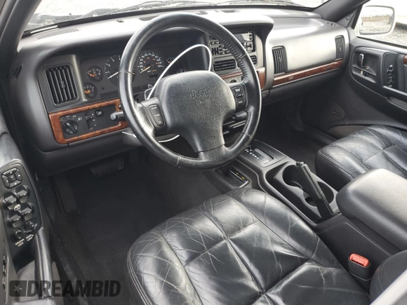 1997 Jeep Grand Cherokee Limited with VIN 1J4GZ78Y7VC772292, listed as a Copart auction lot 87692445 with 0 mi miles and Salvage Title. Bid and sale history available at carsss.com. Image 8.