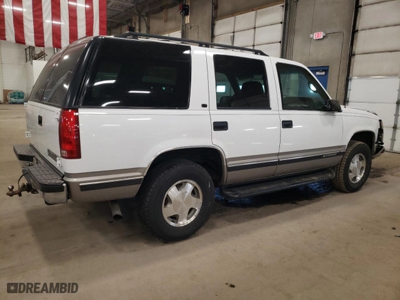 1999 Chevrolet Tahoe Z71 with VIN 1GNEK13R8XJ476282, listed as a Copart auction lot 48573705 with 207,260 mi miles and Salvage Title. Bid and sale history available at carsss.com. Image 3.