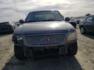 2002 Ford F-150 Harley Davidson with VIN 1FTRW07342KC78218, listed as a Copart auction lot 78273304 with 217,968 mi miles and Salvage Title. Bid and sale history available at carsss.com. Image 5.
