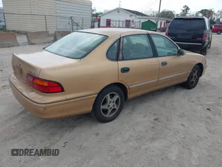 1998 Toyota Avalon XL with VIN 4T1BF18B0WU265372, listed as a IAAI auction lot 41620179 with Not Provided miles and . Bid and sale history available at DreamBid. Image 4.