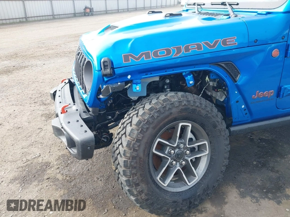 2024 Jeep Gladiator Mojave X z VIN 1C6JJTEG5RL121313, wystawiony jako IAAI lot #41013599 z przebiegiem 2 952 mil mil oraz . Historia ofert i sprzedaży dostępna na DreamBid. Obrazek 18.