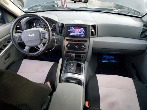 2007 Jeep Grand Cherokee Laredo with VIN 1J8GR48K17C543067, listed as a Copart auction lot 84442224 with 125,446 mi miles and Salvage Title. Bid and sale history available at carsss.com. Image 8.