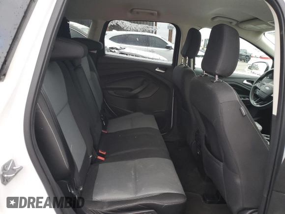 2018 Ford Escape SE z VIN 1FMCU9GD5JUB12877, wystawiony jako Copart lot #51973295 z przebiegiem 121 698 mil mil oraz Szkoda całkowita • Salvage title. Historia ofert i sprzedaży dostępna na DreamBid. Obrazek 10.
