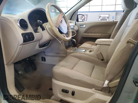 2005 Ford Freestyle SEL z VIN 1FMDK02135GA60009, wystawiony jako Copart lot #52852755 z przebiegiem 248 780 mil mil oraz Szkody całkowita. Historia ofert i sprzedaży dostępna na DreamBid. Obrazek 7.