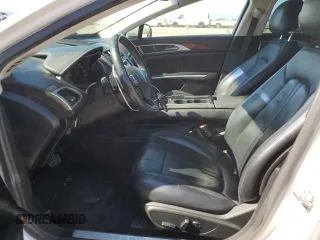 2016 Lincoln MKZ z VIN 3LN6L2G90GR600752, wystawiony jako Copart lot #56599625 z przebiegiem 73 275 mil mil oraz Szkoda całkowita • Salvage title. Historia ofert i sprzedaży dostępna na DreamBid. Obrazek 7.