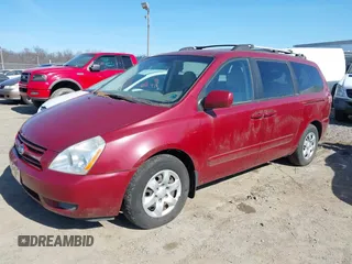 2008 Kia Sedona LX with VIN KNDMB233586245771, listed as a IAAI auction lot 41779801 with 141,157 mi miles. Bid and sale history available at carsss.com. Image 2.