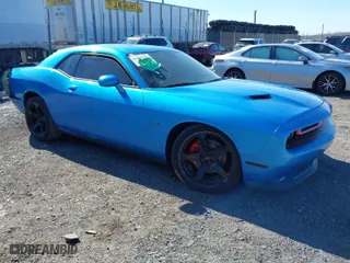 2015 Dodge Challenger R/T with VIN 2C3CDZAT8FH924371, listed as a IAAI auction lot 41870700 with 105,419 mi miles. Bid and sale history available at carsss.com. Image 1.