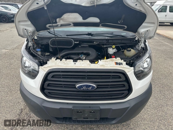 2018 Ford Transit Passenger XL z VIN 1FBZX2CM1JKA87138, wystawiony jako Copart lot #53706825 z przebiegiem 207 885 mil mil oraz Tytuł czysty. Historia ofert i sprzedaży dostępna na DreamBid. Obrazek 7.