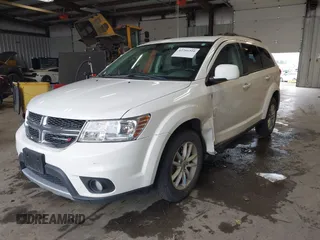 2018 Dodge Journey SXT with VIN 3C4PDDBGXJT469945, listed as a IAAI auction lot 42266310 with 121,871 mi miles and . Bid and sale history available at DreamBid. Image 17.