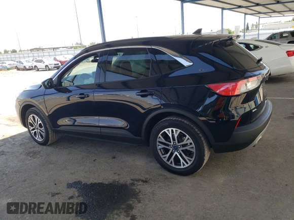2021 Ford Escape SEL with VIN 1FMCU9H65MUA70490, listed as a Copart auction lot 57815275 with 62,227 mi miles and Salvage title. Bid and sale history available at DreamBid. Image 2.