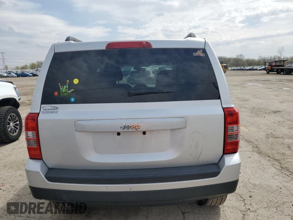2013 Jeep Patriot Sport with VIN 1C4NJPBA9DD265273, listed as a Copart auction lot 52697955 with 154,472 mi miles and Salvage Title. Bid and sale history available at carsss.com. Image 6.