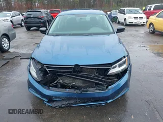 2015 Volkswagen Jetta Sedan 1.8T SE with VIN 3VWD17AJ7FM233634, listed as a IAAI auction lot 41942329 with 128,996 mi miles. Bid and sale history available at carsss.com. Image 6.