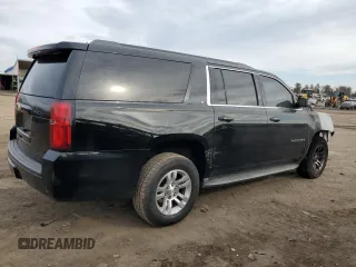 2015 Chevrolet Suburban LT with VIN 1GNSKJKC7FR122155, listed as a Copart auction lot 46984425 with Not Provided miles and Salvage Title. Bid and sale history available at DreamBid. Image 3.