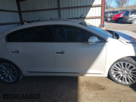 2014 Buick LaCrosse Premium II with VIN 1G4GF5G31EF166411, listed as a IAAI auction lot 41240048 with 82,231 mi miles and . Bid and sale history available at DreamBid. Image 14.