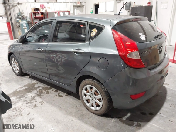 2013 Hyundai Accent GL with VIN KMHCT5AEXDU100208, listed as a IAAI auction lot 41517792 with 164,510 mi miles. Bid and sale history available at carsss.com. Image 3.
