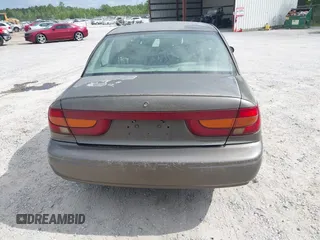 2000 Saturn SL z VIN 1G8ZK527XYZ121984, wystawiony jako IAAI lot #42099839 z przebiegiem 174 210 mil mil oraz . Historia ofert i sprzedaży dostępna na DreamBid. Obrazek 16.