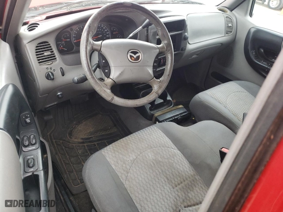 2002 Mazda B-Series 2WD Truck DS with VIN 4F4YR12U72TM19891, listed as a Copart auction lot 44341875 with 217,757 mi miles and Clean Title. Bid and sale history available at carsss.com. Image 8.