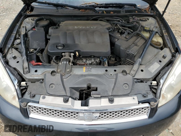 2014 Chevrolet Impala LS with VIN 2G1WA5E33E1127966, listed as a Copart auction lot 61458245 with 166,744 mi miles and Salvage title. Bid and sale history available at DreamBid. Image 11.