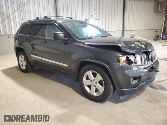 2011 Jeep Grand Cherokee Laredo with VIN 1J4RS4GG9BC517059, listed as a Copart auction lot 52704705 with 120,171 mi miles and Salvage Title. Bid and sale history available at DreamBid. Image 4.