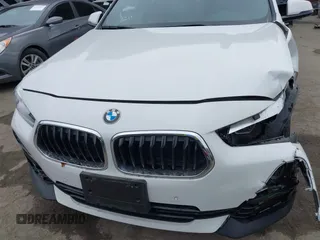 2022 BMW X2 sDrive28i z VIN WBXYH9C06N5U37719, wystawiony jako IAAI lot #42355050 z przebiegiem 33 127 mil mil oraz . Historia ofert i sprzedaży dostępna na DreamBid. Obrazek 6.