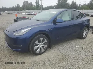 2022 Tesla Model Y Long Range z VIN 7SAYGDEE6NF429651, wystawiony jako Copart lot #57172355 z przebiegiem 19 499 mil mil oraz Szkoda całkowita • Salvage title. Historia ofert i sprzedaży dostępna na DreamBid. Obrazek 1.