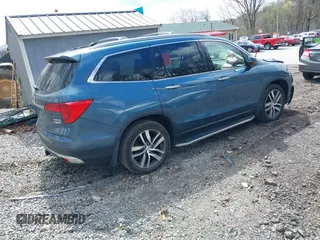 2017 Honda Pilot Touring with VIN 5FNYF6H93HB017623, listed as a IAAI auction lot 41996650 with 97,946 mi miles. Bid and sale history available at carsss.com. Image 4.