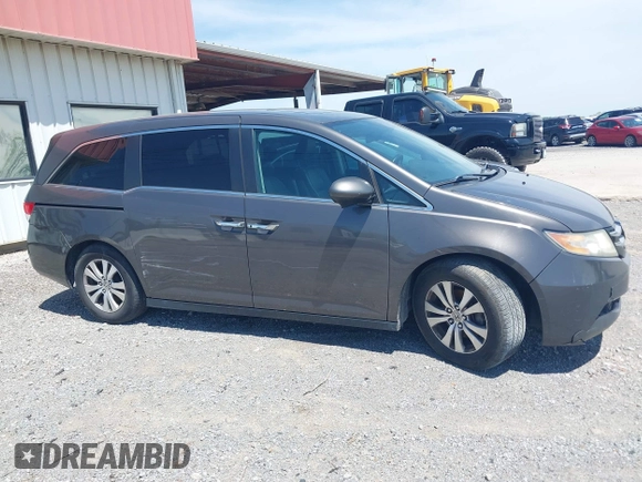 2014 Honda Odyssey EX-L with VIN 5FNRL5H6XEB111412, listed as a IAAI auction lot 41917361 with 210,841 mi miles and . Bid and sale history available at carsss.com. Image 13.