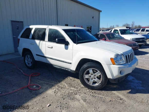 2007 Jeep Grand Cherokee Laredo with VIN 1J8HS48PX7C657685, listed as a IAAI auction lot 41748528 with 247,534 mi miles. Bid and sale history available at carsss.com. Image 1.