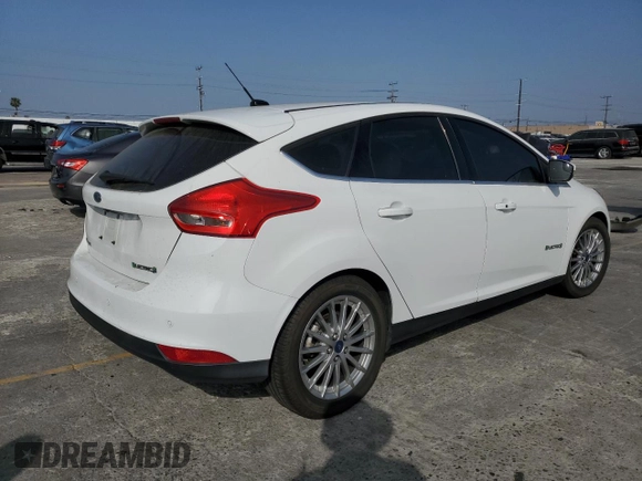 2015 Ford Focus Electric z VIN 1FADP3R43FL204874, wystawiony jako Copart lot #57968814 z przebiegiem 104 590 mil mil oraz Tytuł czysty. Historia ofert i sprzedaży dostępna na DreamBid. Obrazek 3.