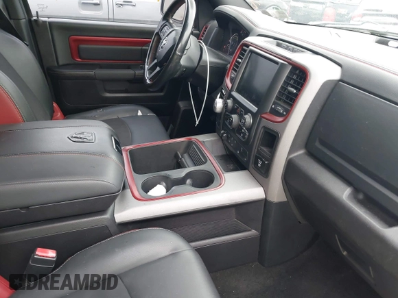 2016 Ram 1500 Rebel z VIN 1C6RR7YT0GS100285, wystawiony jako IAAI lot #42346719 z przebiegiem 103 309 mil mil oraz . Historia ofert i sprzedaży dostępna na DreamBid. Obrazek 5.
