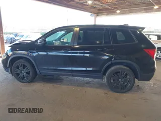 2021 Honda Passport Sport with VIN 5FNYF8H27MB021098, listed as a IAAI auction lot 41333241 with 101,239 mi miles and . Bid and sale history available at DreamBid. Image 14.
