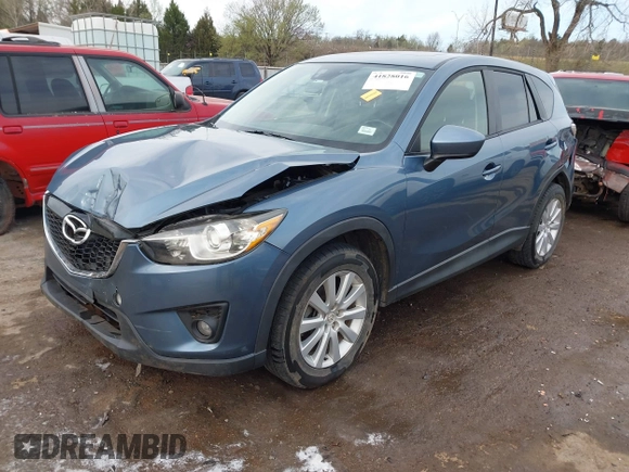 2014 Mazda CX-5 Grand Touring with VIN JM3KE4DYXE0403192, listed as a IAAI auction lot 41828016 with 156,270 mi miles and . Bid and sale history available at carsss.com. Image 2.
