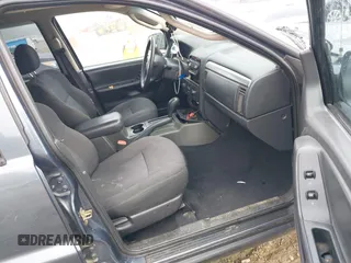 2002 Jeep Grand Cherokee Laredo z VIN 1J4GX48S62C201579, wystawiony jako IAAI lot #42102238 z przebiegiem 262 630 mil mil oraz . Historia ofert i sprzedaży dostępna na DreamBid. Obrazek 5.