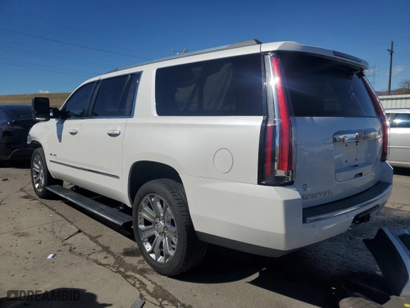 2016 GMC Yukon XL Denali with VIN 1GKS2HKJXGR354934, listed as a Copart auction lot 50628345 with 128,337 mi miles and Salvage Title. Bid and sale history available at carsss.com. Image 2.
