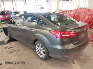 2015 Ford Focus SE with VIN 1FADP3F2XFL201554, listed as a IAAI auction lot 41817418 with 101,938 mi miles. Bid and sale history available at carsss.com. Image 3.