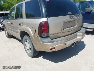 2004 Chevrolet TrailBlazer LS with VIN 1GNDT13S842332717, listed as a IAAI auction lot 41970692 with 261,212 mi miles. Bid and sale history available at carsss.com. Image 3.