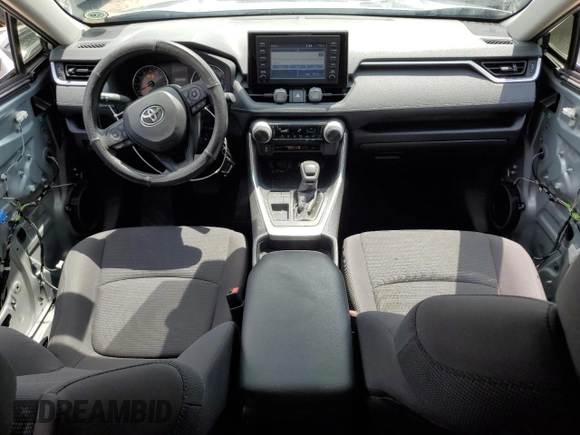 2019 Toyota RAV4 LE with VIN JTMH1RFV0KJ006644, listed as a Copart auction lot 59546835 with 101,050 mi miles and Salvage title. Bid and sale history available at DreamBid. Image 8.