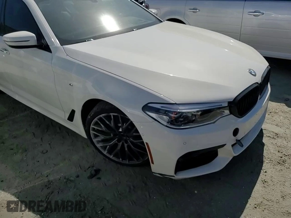 2018 BMW 5 Series 540i xDrive with VIN WBAJE7C52JG891212, listed as a Copart auction lot 58119195 with 73,770 mi miles and Salvage title. Bid and sale history available at DreamBid. Image 13.