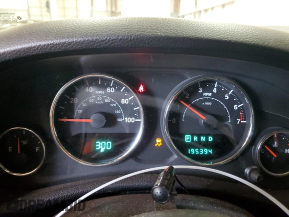2012 Jeep Wrangler Unlimited Sport z VIN 1C4BJWDG2CL171531, wystawiony jako Copart lot #62181805 z przebiegiem 195 394 mil mil oraz Szkoda całkowita • Salvage title. Historia ofert i sprzedaży dostępna na DreamBid. Obrazek 9.