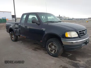 1999 Ford F-150 with VIN 1FTRX18W2XNA90069, listed as a IAAI auction lot 41496543 with 115,787 mi miles and . Bid and sale history available at DreamBid. Image 1.