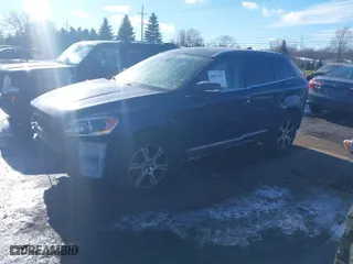 2015 Volvo XC60 T6 Platinum with VIN YV4902RM1F2648904, listed as a IAAI auction lot 40987622 with 80,745 mi miles. Bid and sale history available at carsss.com. Image 2.