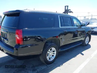 2018 Chevrolet Suburban LS z VIN 1GNSKGKC6JR150248, wystawiony jako IAAI lot #42219120 z przebiegiem 48 321 mil mil oraz . Historia ofert i sprzedaży dostępna na DreamBid. Obrazek 4.