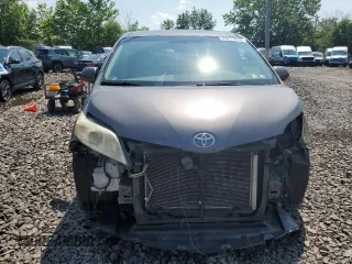 2012 Toyota Sienna XLE AAS with VIN 5TDYK3DC3CS237344, listed as a Copart auction lot 63271815 with 105,860 mi miles and Salvage title. Bid and sale history available at DreamBid. Image 5.