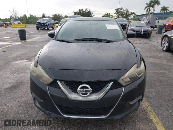 2016 Nissan Maxima SR with VIN 1N4AA6AP9GC428938, listed as a IAAI auction lot 42419663 with 121,501 mi miles and . Bid and sale history available at DreamBid. Image 6.